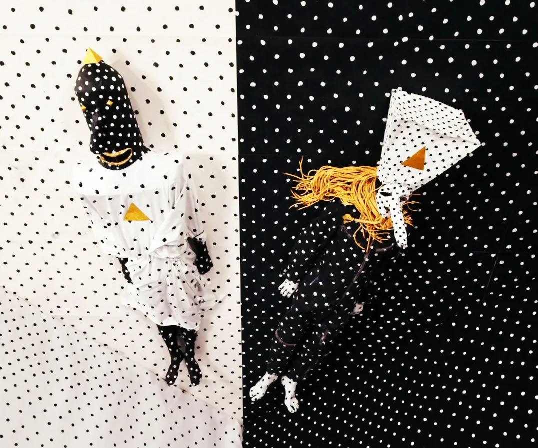 Angine de Poitrine in black-and-white costumes